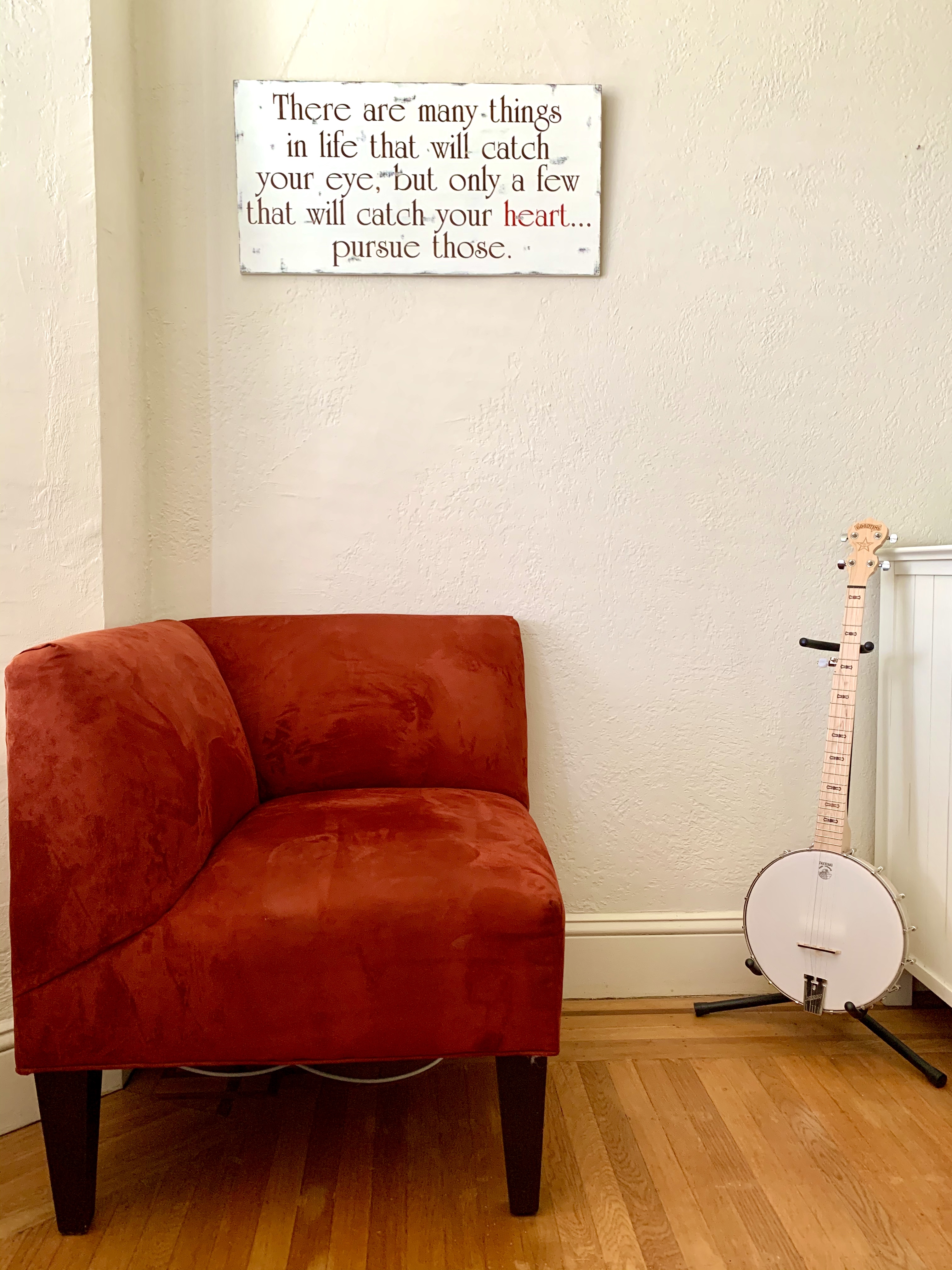 Picture of empty chair and banjo